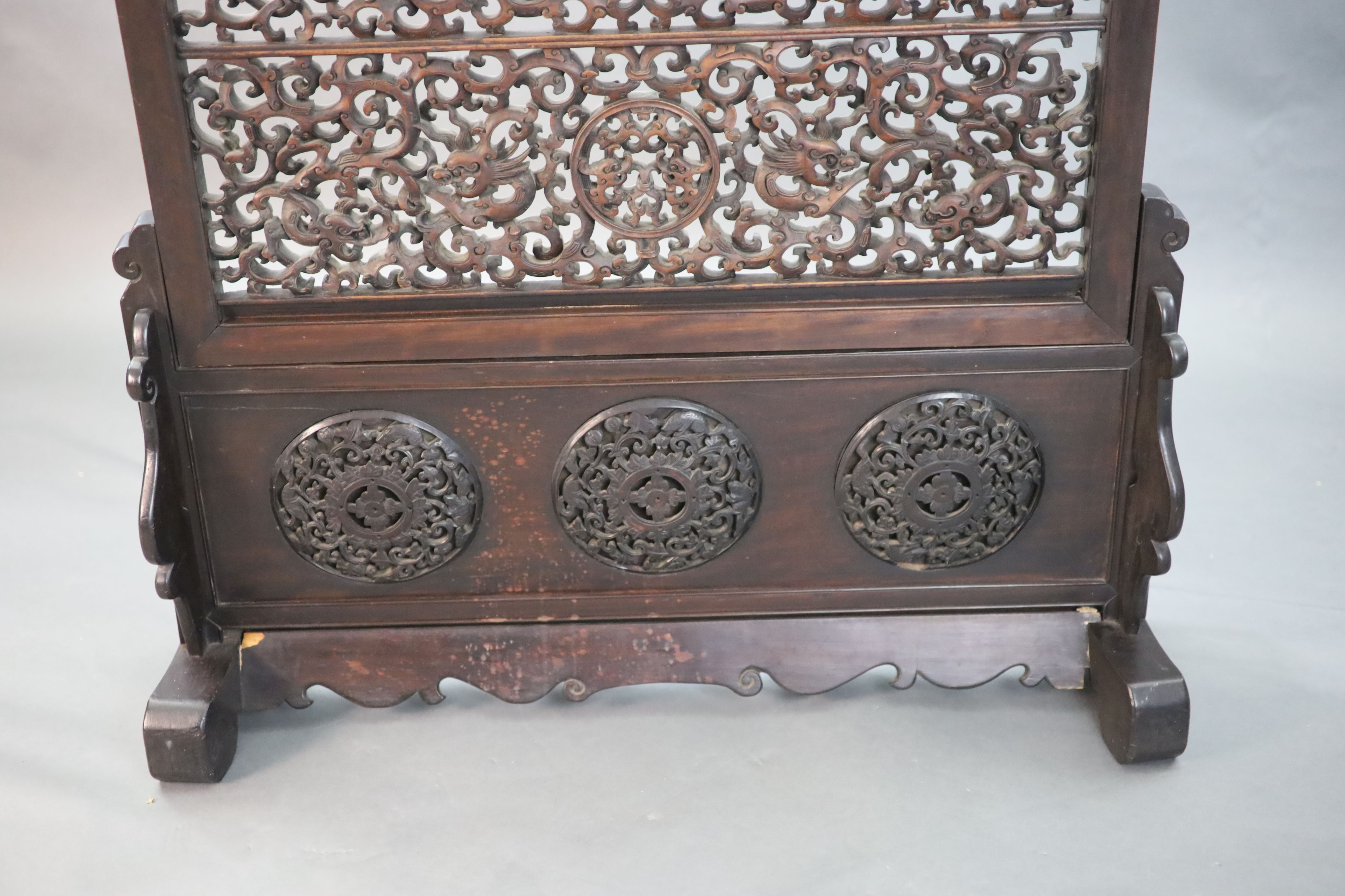 A large Chinese hardwood table screen, c.1910, 93.5cm high, 93.5cm wide, Provenance - A. T. Arber-Cooke